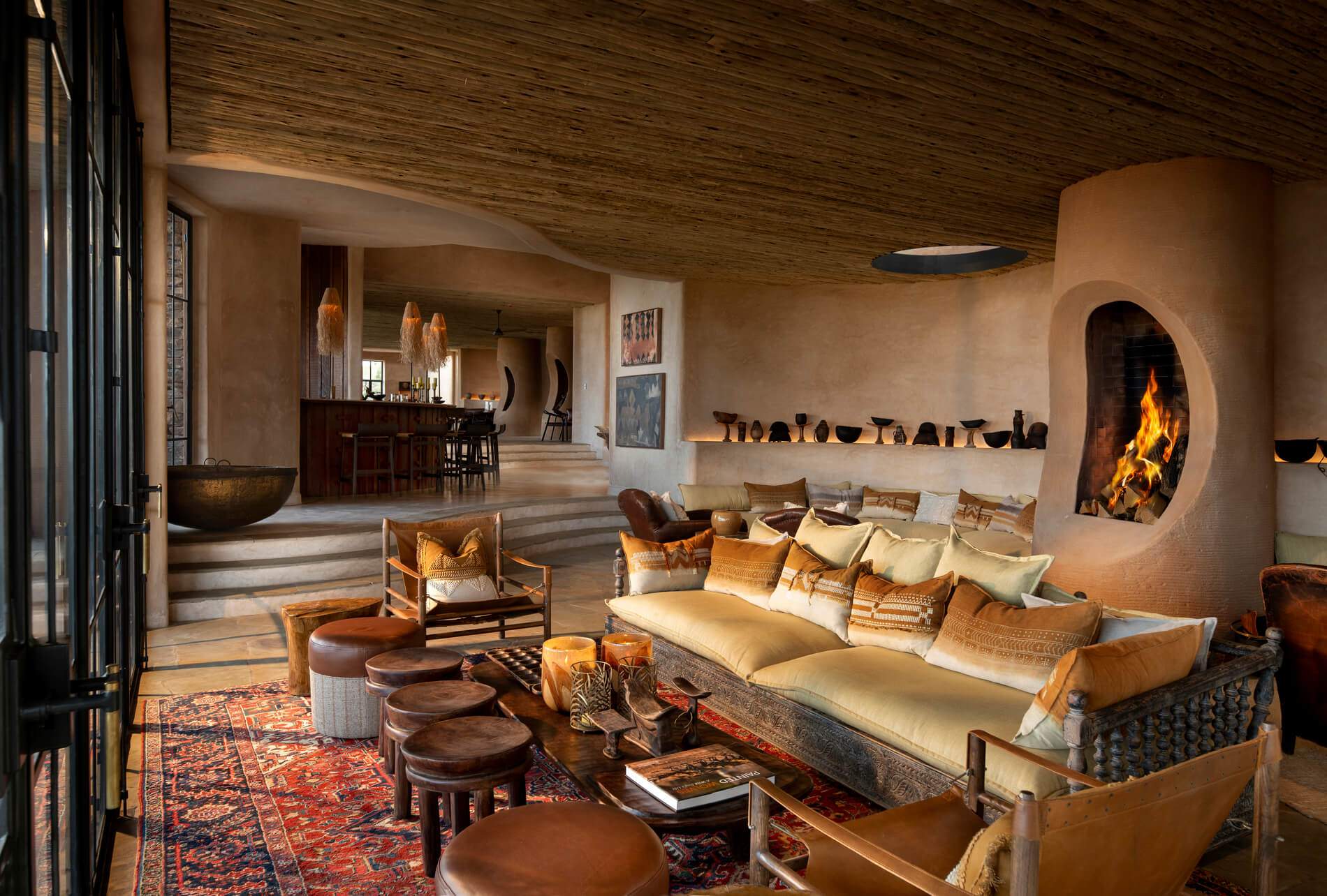 A living room with a couch and a table.