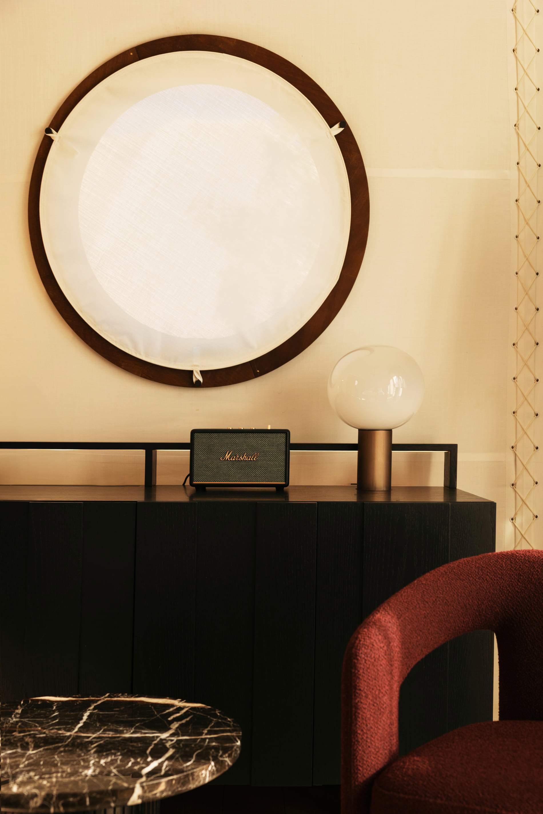A black table with a radio on it.