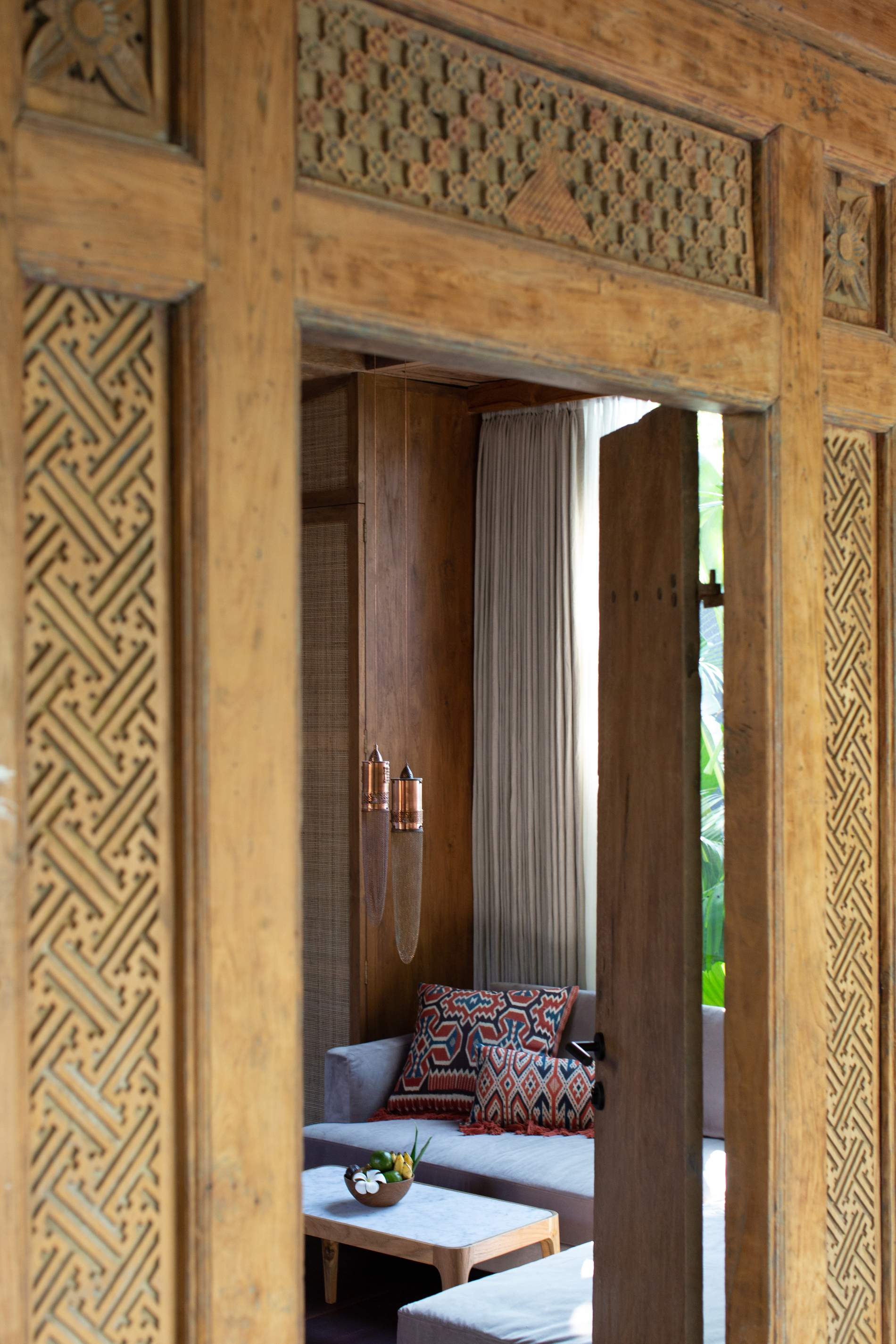 A wooden door with a decorative design on it.