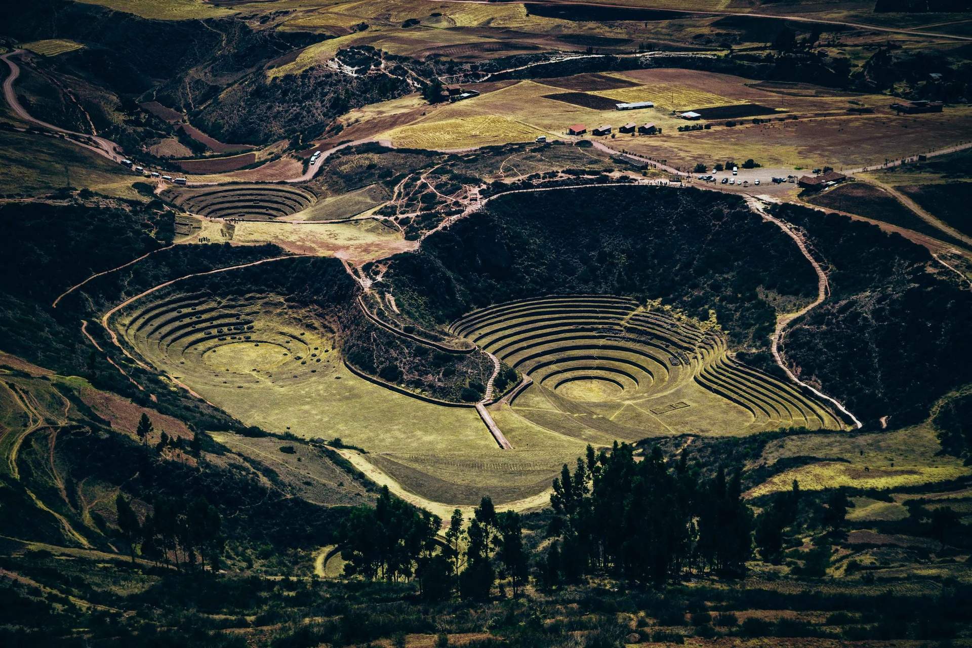A large hill with a series of terraces carved into it.