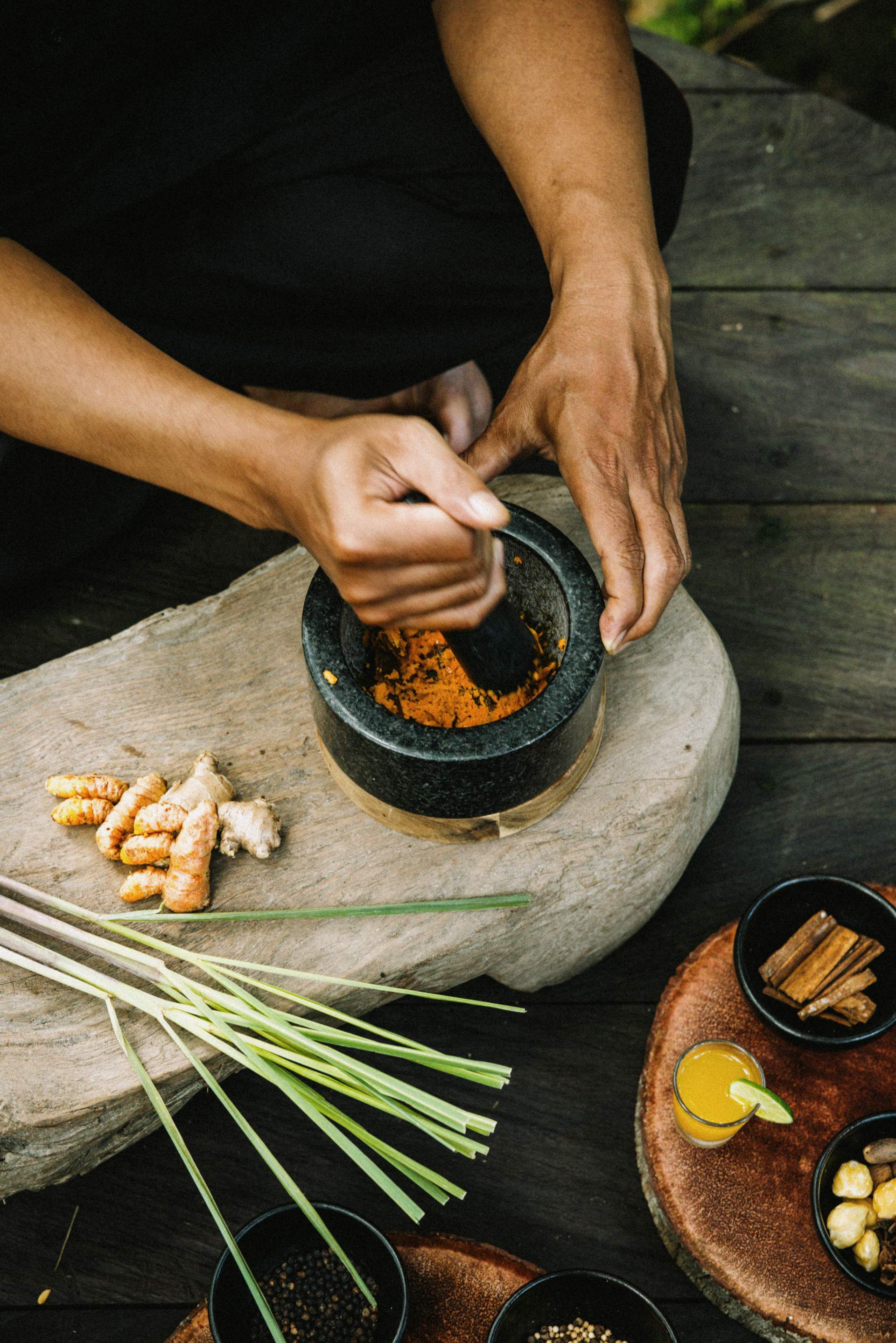 A person is preparing food in a bowl.