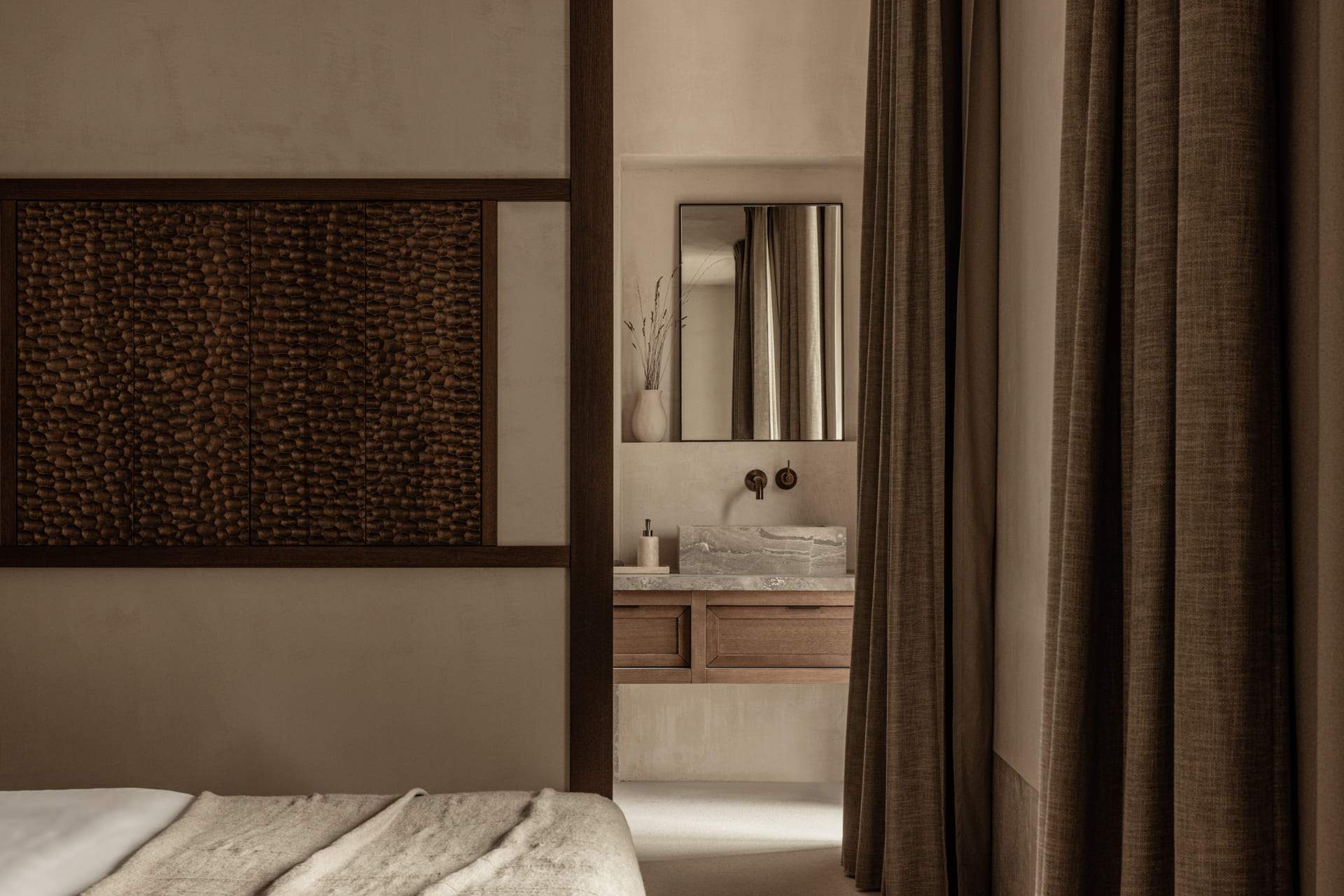 A bathroom with a sink and mirror.